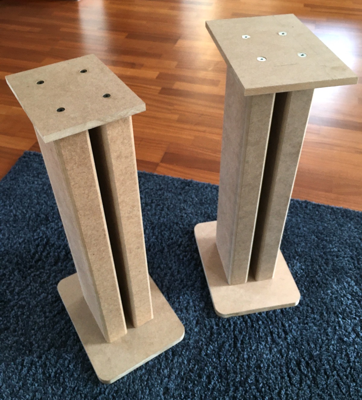 Test assembly of my DIY speaker stands with different top plates.