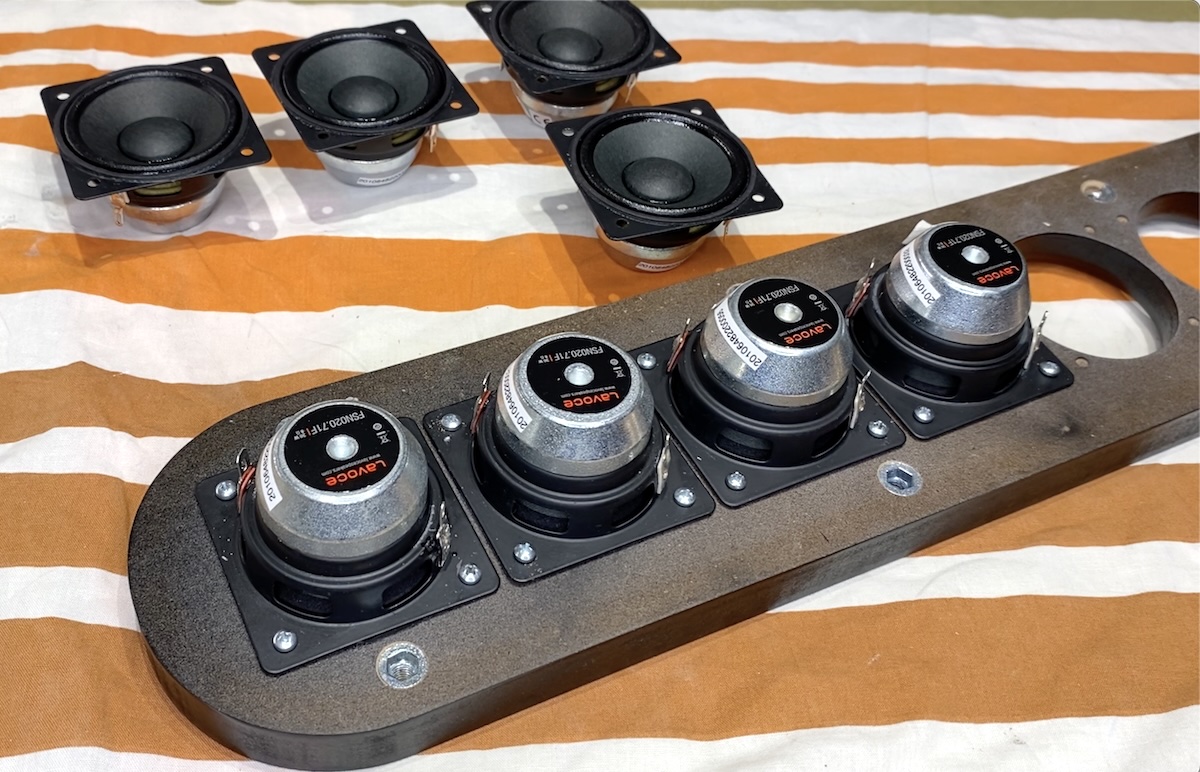 Full-range drivers rear-mounted to the baffle.