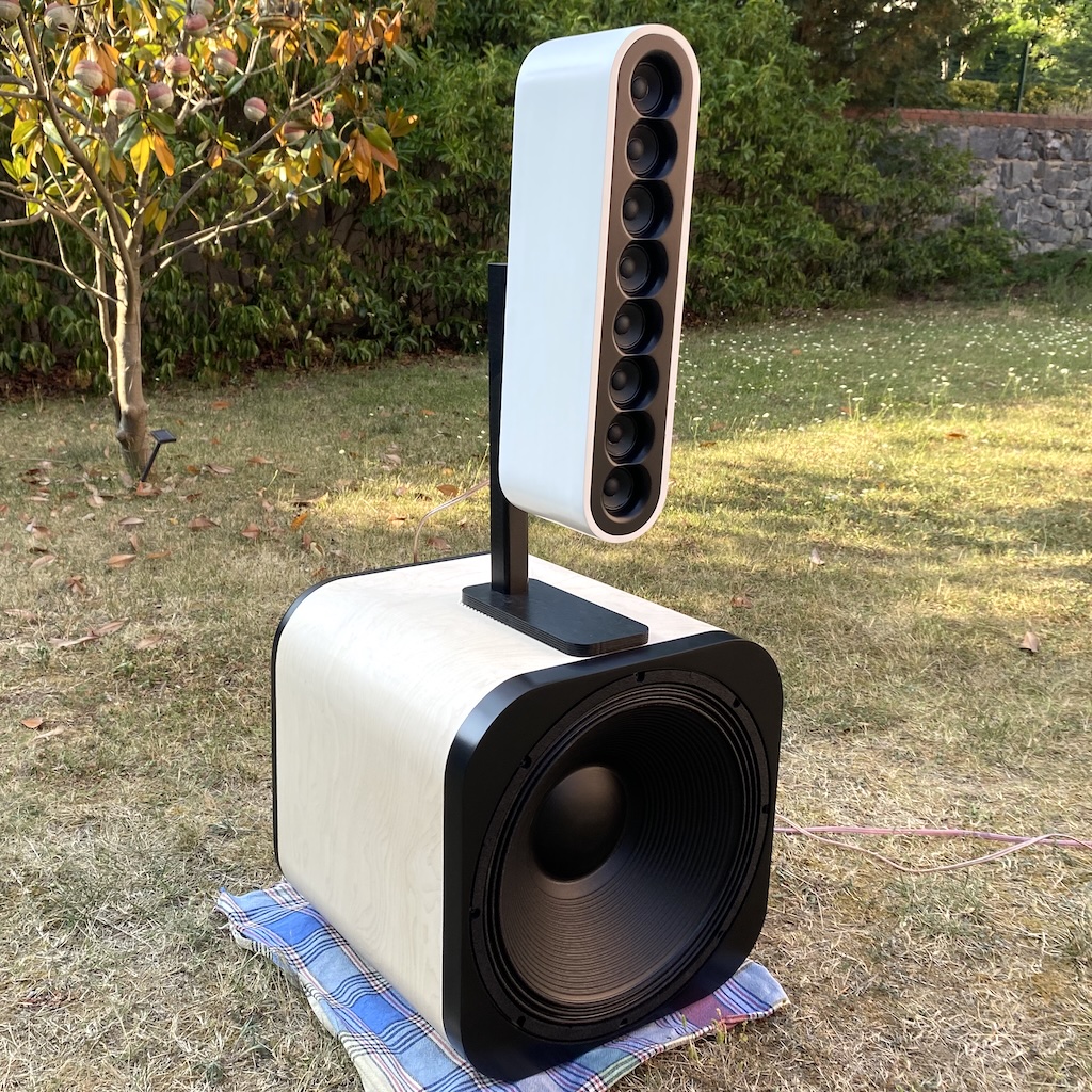 Line array speaker placed on a subwoofer.